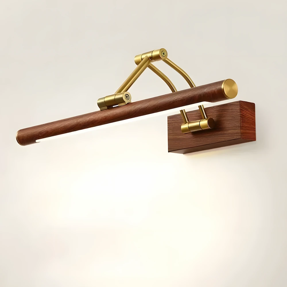 Wood grain and brass picture light showing two different adjustable positions for versatile artwork lighting angles